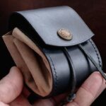 Making leather coin purse. Leather craft.